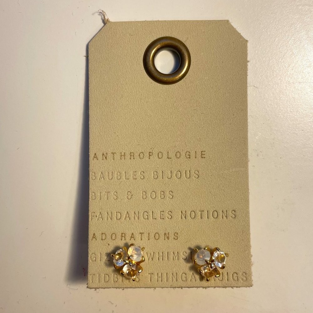 Gold and white stud earrings